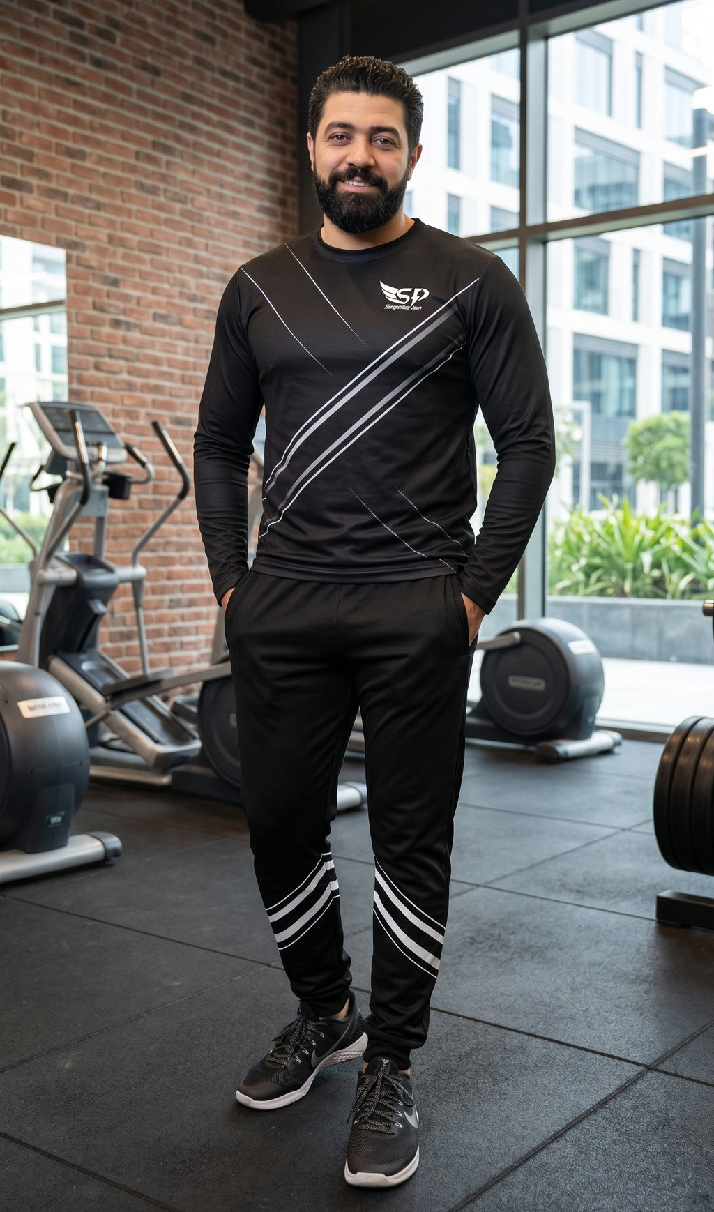 Sportify tracksuit set with black long-sleeve crew sweatshirt and joggers featuring reflective diagonal stripes
